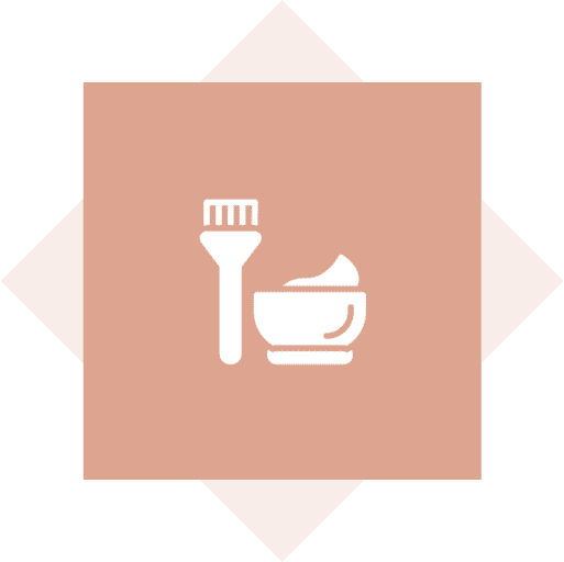 Bowl and brush icon on brown background.